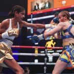 FUNDORA UNIFIES FLYWEIGHT TITLE, MAKES HISTORY