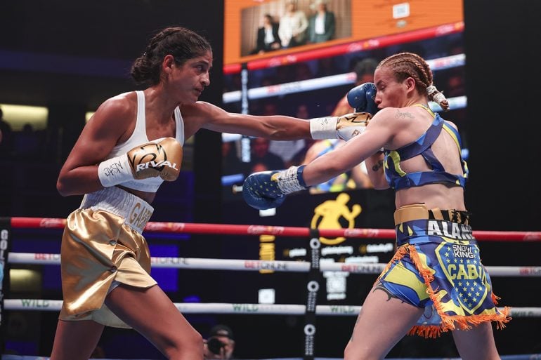 FUNDORA UNIFIES FLYWEIGHT TITLE, MAKES HISTORY